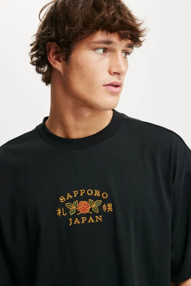 Cotton On Tees and Tanks Box Fit Graphic TShirt Blacksapporo 8211 Men Cotton On Tees and Tanks Box Fit Graphic TShirt Blacksapporo 8211 Men